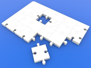 White unfinished puzzle on blue