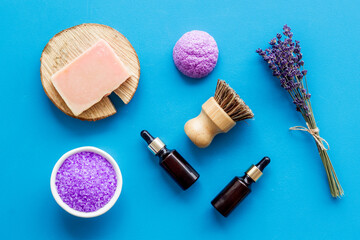 Fototapeta na wymiar Lavender essential oil soap and sea salt, top view