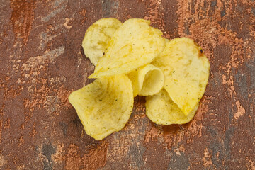 Natural potato salted chips heap