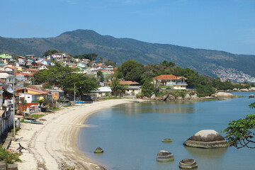 Fototapeta na wymiar Florianopolis seaside with bizarre stones in water