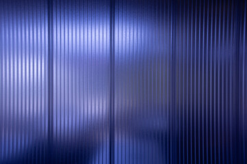 some segments of a transparent office room divider, blue transparent partition wall as healthy protection theme for office work
