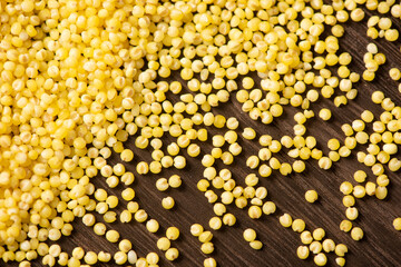 Yellow millet background-texture and details - traditional food