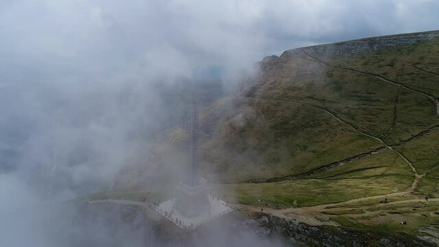 4K aerial video of Caraiman Heroes Cross from Bucegi Mountains in Romania