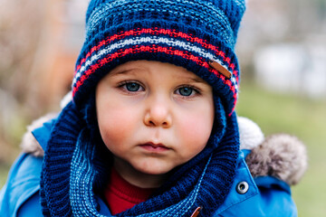 Portrait of a boy outdoors on a winter day