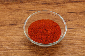 Dry paprika powder in the bowl