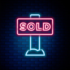 Glowing neon line Hanging sign with text Sold icon isolated on brick wall background. Sold sticker. Sold signboard. Colorful outline concept. Vector.