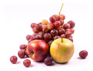 Bunch of grapes and apples on white background