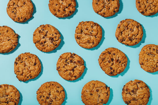 Oatmeal cookies on a blue background with a pattern in the form of a pattern.