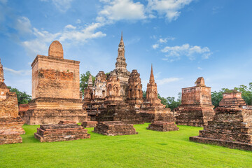 Fototapeta na wymiar Ancient pagoda and monastery complex at Wat Mahathat temple, Sukhothai Historical Park, Thailand