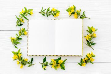 Happy Easter mockup - yellow flowers, flat lay, top view