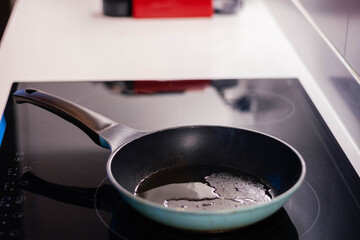 close-up of frying pan in electric cooker