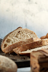 Homemade bread sourdough, rustic baked bread in wickerwork basket