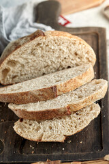 Homemade bread sourdough, rustic baked bread in wickerwork basket