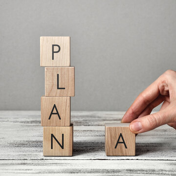 Wooden cubes with the inscription: Plan A. Choosing plan A in a person's life