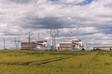 Fototapeta na wymiar Reactor of nuclear power plant Temelin in Czech Republic. Cloudy sky. 