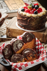 Palmier biscuits covered of chocolate on a plate. Heart-shaped puff pastry, pig's ear, palm leaves cookies, elephant ears, french hearts, shoe-soles.