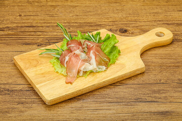 Sliced pork Jamon with rosemary