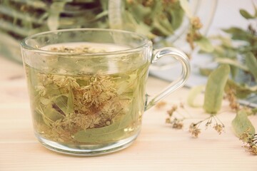 Linden tea in glass cup, herbal tea for cold and flu