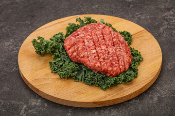Raw beef burger cutlet for cooking