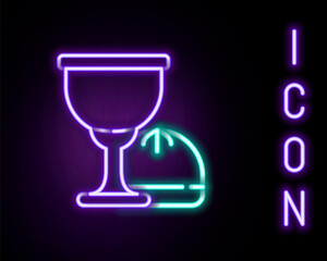 Glowing neon line Holy grail or chalice icon isolated on black background. Christian chalice. Christianity icon. Colorful outline concept. Vector.