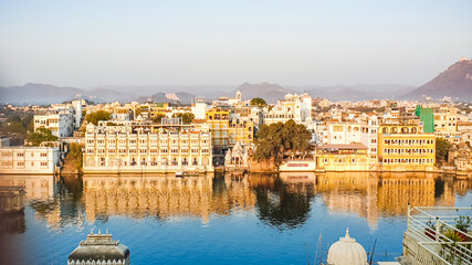 Fototapeta na wymiar View of Udaipur city at the Pichola Lake from rooftop, Rajasthan, India