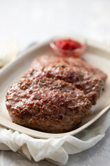 fried ground meat with tomato sauce on dish