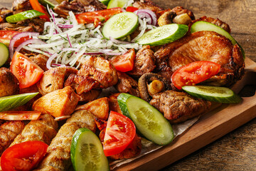 Grilled various meat mix vith vegetables