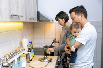 Asian family preparing healthy meal