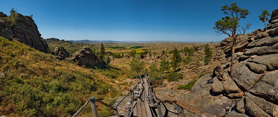 East Kazakhstan. Tourist trail to the top of the ancient remains in the Bayanaul Nature Park, where the famous Konyr Aulie cave is located.