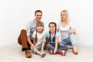 Portrait of a happy family smiling at home