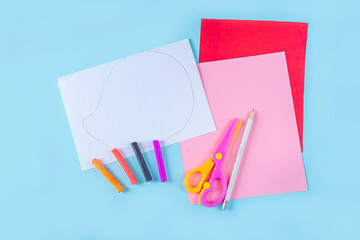 DIY and kid's creativity. Step by step instruction: how to make valentine card, hedgehog with hearts. Step1 preparation tools (sheets of colored paper, pencils, scissors). Craft for Valentines day.