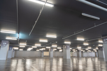 Clean and glossy flooring of the Parking lot in the parking building