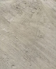 Dry stony dusty ground. Rustic road texture