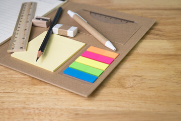 note paper colour and pencil with eraser ruler background, selective focus note paper colour