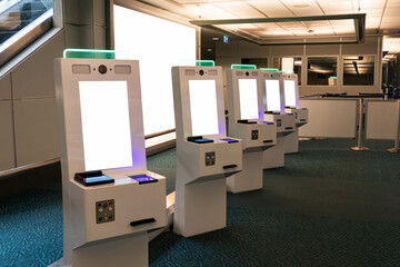 Self service card dispenser with passport scanner touch screen in immigration zone at the airport