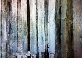 background of old and dirty wood and tin vertical stripes of gray light and dark colors
