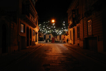 Fototapeta na wymiar sliema at night. fiesta on the street in Malta. street at night. street with lights.