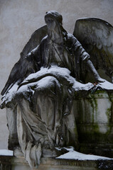 Tombstones and graves, family crypts and vaults on graveyard or cemetery with angels, saints and...