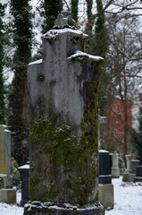 Tombstones and graves, family crypts and vaults on graveyard or cemetery with angels, saints and...