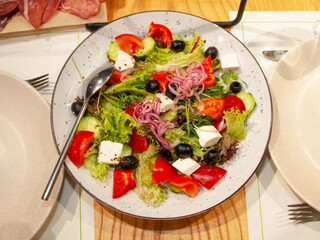 Greek salad appetizer fresh on table