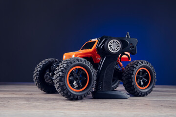 remote control and toy car - Powered by Adobe