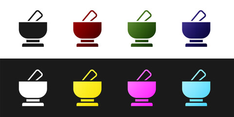 Set Mortar and pestle icon isolated on black and white background. Vector.