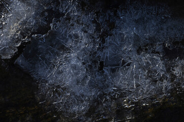 Obraz premium Beautiful abstraction of real ice near the river Bank in winter