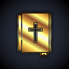 Gold Holy bible book icon isolated on black background. Vector.