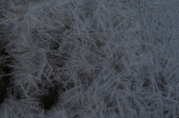 Beautiful abstraction of real ice near the river Bank in winter