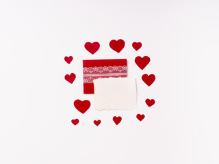 Isolated paper envelope with lace and a hearts on the white background with copy space