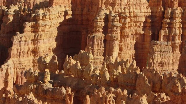 Looking from deep in the canyon to the top of the hoodoos at Bryce Canyon at Sunset Point. Utah, USA. Panorama upwards, left to right