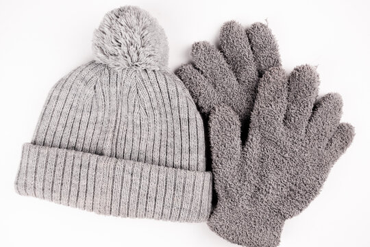 .Knitted hat and gloves Isolate on white. Cap and gloves.