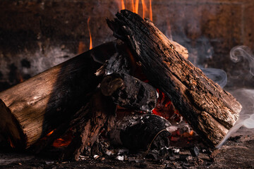 fire logs and flame to make asado heat home cordoba argentina