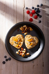 Heart shaped pancakes with nuts